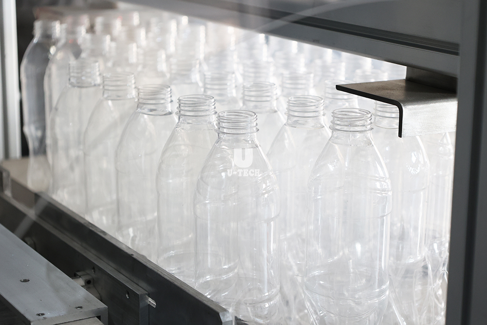 Автоматическая пластиковая машина для упаковки в мешки для круглых пустых бутылок PE PP HDPE PET